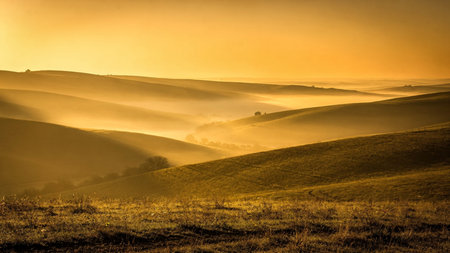Tuscany landscape with fog at sunrise. Tuscany, Italy