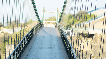 Close up view of a suspension bridge over the Guadalquivir riverの写真素材