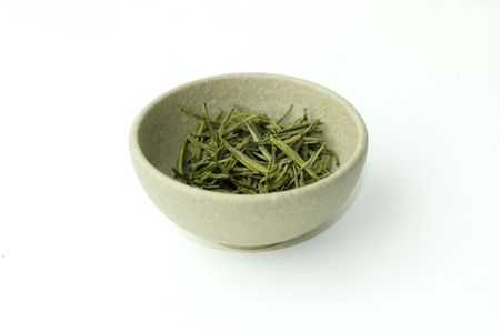 green tea in a clay cupの写真素材