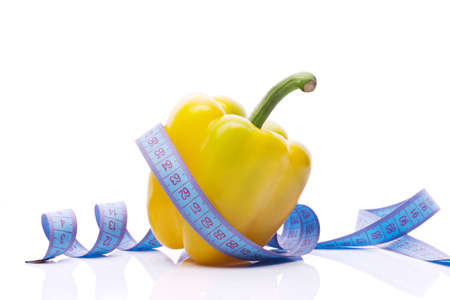 sweet yellow pepper with measuring tapeの写真素材