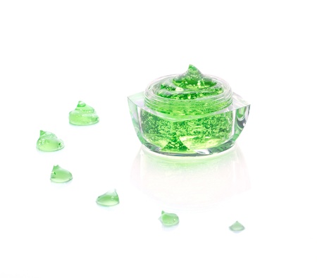 oxygen cosmetics gel in glass jar and gel drop isolated on whiteの写真素材