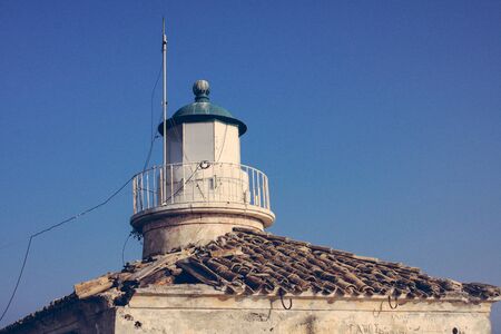 Roof of the Lighthouse in Corfu and blue sky. Greece.の写真素材