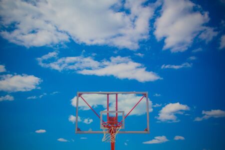 basketball hoop on blue skyの写真素材