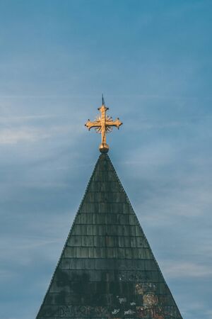 cross on the top of a church