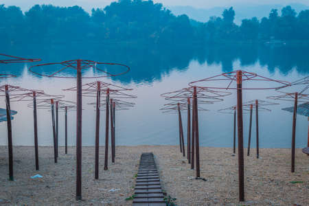 parasols on the beach in the fallの写真素材