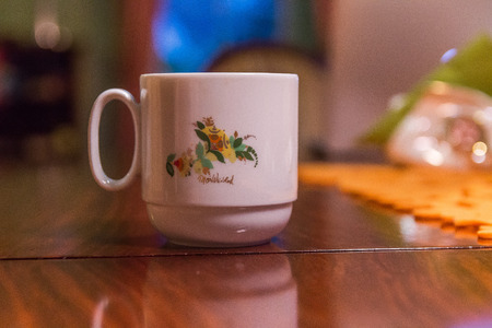 graphic coffee cup on table shallow depth of focusの写真素材