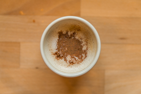 beautiful mug of roasted coffee at officeの写真素材