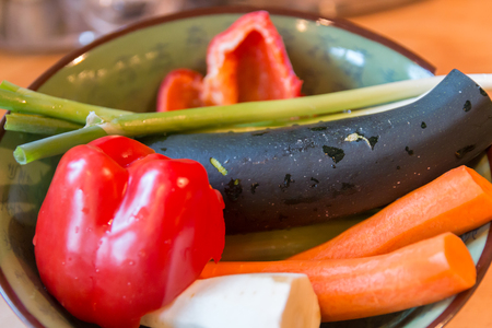 fresh vegetable in a green bowlの写真素材