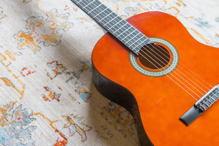 classical guitar shot in a bohemian way