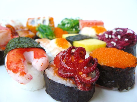 Japanese food. Sushi roll set on white plate isolated on white background.の写真素材
