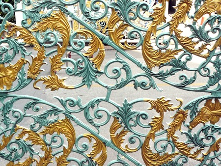 Close up floral swirl green and gold pattern design of the metallic.の写真素材