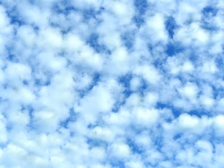 Beautiful blue sky with fluffy white cloud in a bright day, become to background scenery in a sunny day.の写真素材