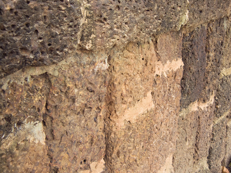 Ruin of old red brick stone, texture background on ancient wall Si Satchanalai Historical Park, Sukhothai province, one of Thailand'sの写真素材