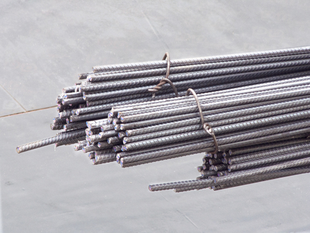 A photo of steel rods or bars used to reinforce concrete for construction..の写真素材