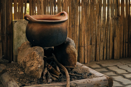 Boiler pot for cooking Made from clay. It is a traditional cooking equipment of the Thai people. By being reluctant to give a hundred by burningの写真素材