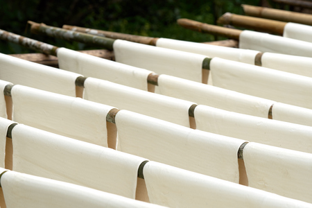 Rubber sheets dry The raw rubber latex is made of acid, which makes it first and then rolled flat to...