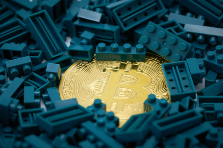 a gold bit coin in the middle of a green jug block. Communications to Invest in the Digital...