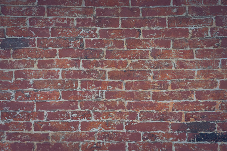 red brick wall texture grunge background with vignetted corners, may use to interior design....