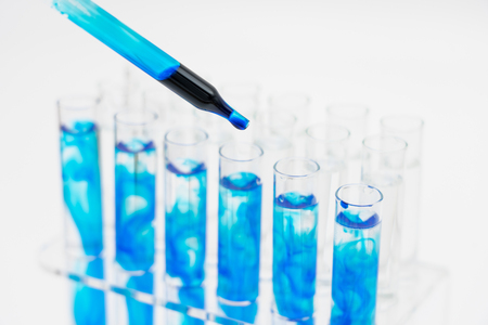 In the laboratory, scientists synthesized and analyzed the compound by dropping colored liquid in...