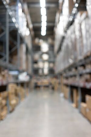 Abstract blurred supermarket view of empty supermarket aisle, defocused blurry background with bokeh light in store. Business concept.の写真素材