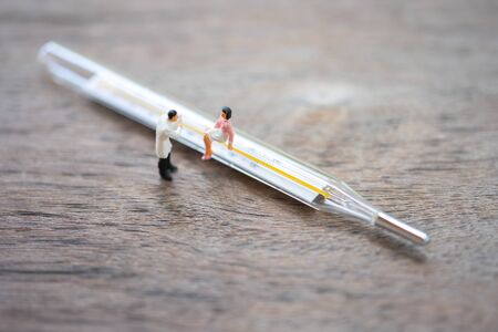 Miniature people Consult a doctor to ask for health problems. Annual health check or consult a...