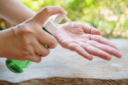 alcohol gel helps to wash your hands thoroughly To prevent infection Covid 19 viruses or coronavirus And various pathogens. concept healthcare system ,stay safe and hand sanitizer.の写真素材