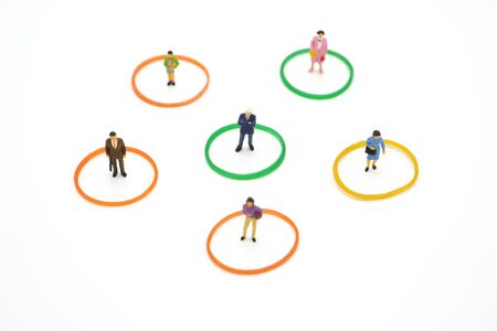 Social distancing. Miniature people stay apart to reduce Covid 19 virus infection. Maintain social distance Detained, could not find anyone. using as background Healthcare concept and keep distance.の写真素材