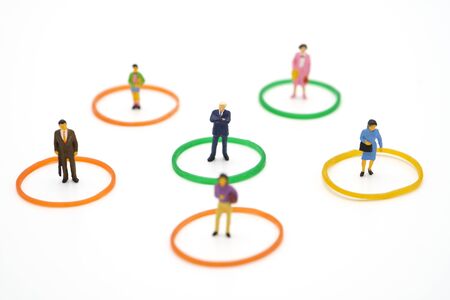 Social distancing. Miniature people stay apart to reduce Covid 19 virus infection. Maintain social distance Detained, could not find anyone. using as background Healthcare concept and keep distance.の写真素材