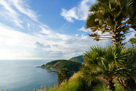 Tourists at Phromthep cape viewpoint at the south of Phuket Island, Thailand. Tropical paradise in Thailand. Phuket is a popular destination famous for touristsの写真素材