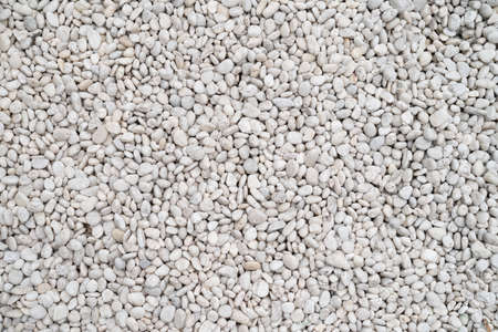 Loft-style plaster walls, gray, white, empty space used as wallpaper. Popular in home design or...