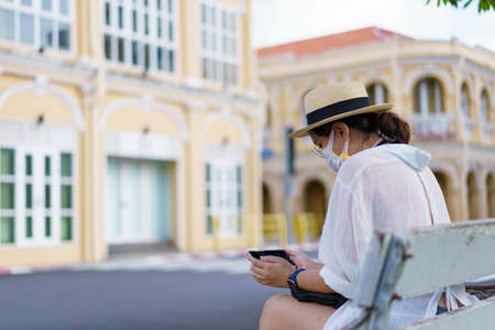Travelers on street Phuket old town with Building Sino Portuguese architecture at Phuket Old Town area Phuket, Thailand. Travel conceptの写真素材
