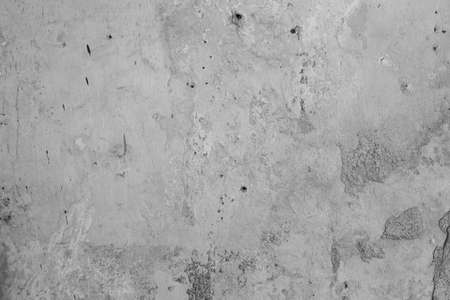 Loft-style plaster walls, gray, white, empty space used as wallpaper. Popular in home design or interior design. with copy spaces.の写真素材