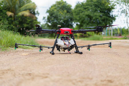 agricultural drone Fly for fertilizers and pesticides. modern agriculture new agricultural innovation automatic droneの写真素材