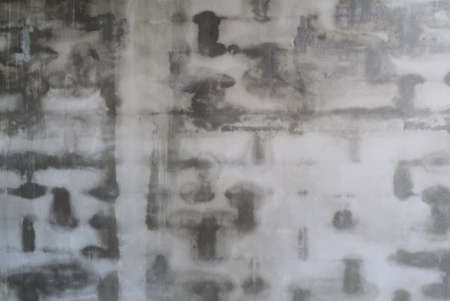 Loft-style plaster walls, gray, white, empty space used as wallpaper. Popular in home design or interior design. with copy spaces.の写真素材