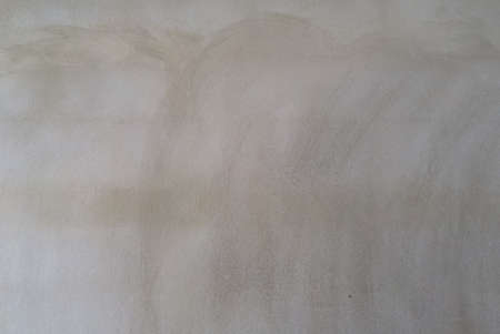 Loft-style plaster walls, gray, white, empty space used as wallpaper. Popular in home design or interior design. with copy spaces.の写真素材