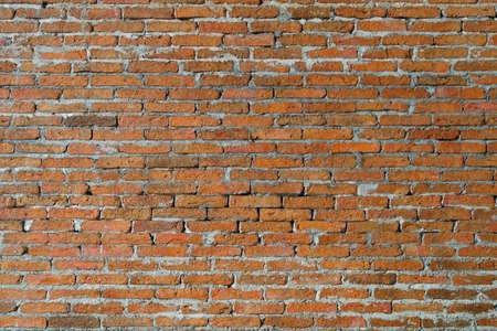 red brick wall texture grunge background. modern style background, industrial architecture detail display and montage of product. Interior design concept, background texture with copy spaces.の写真素材