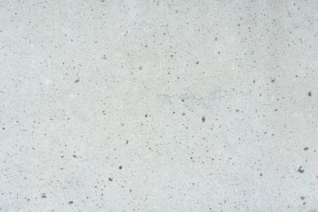 Loft-style plaster walls, gray, white, empty space used as wallpaper. Popular in home design or interior design. with copy spaces.の写真素材