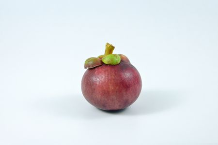 Asian fruit mangosteen on white background.の写真素材
