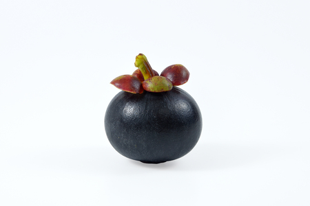 Asian fruit mangosteen on white background.の写真素材