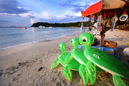 Turtle Inflatable raft and beach toys on the beach,Koh Samet.の写真素材