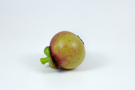 Asian fruit mangosteen on white background.の写真素材