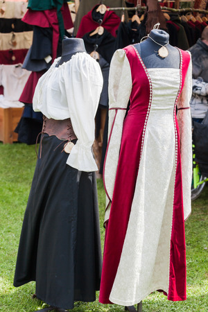 Medieval dresses at a medieval marketの写真素材