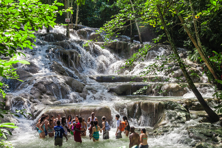 Ocho Rios, Jamaica - November 15, 2016: The Dunn's River Falls are waterfalls in Ocho Rios in Jamaica, which can be climbed by tourists.のeditorial素材