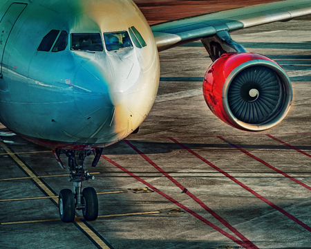 Passenger aircraft on the taxiway of an airport.の写真素材