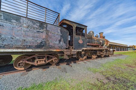 Encarnacion, Paraguay - November 14, 2018: Old rusted steam locomotive at Encarnacion. In Paraguay...