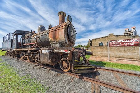 Encarnacion, Paraguay - November 14, 2018: Old rusted steam locomotive at Encarnacion. In Paraguay...