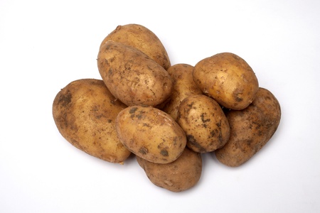 Bunch of potatoes on whiteの写真素材