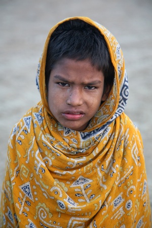KUMROKHALI, INDIA - JANUARY 14: Portrait of boy on street on January 14, 2009 in Kumrokhali, West...