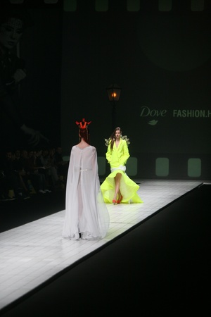 ZAGREB, CROATIA - MARCH 15: Fashion model wears clothes made by design group "Clash of 9" on "Dove FASHION.HR" show on March 15, 2012 in Zagreb, Croatia.のeditorial素材