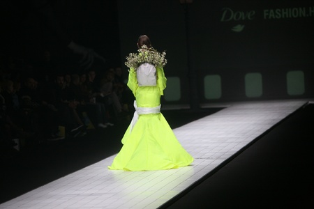 ZAGREB, CROATIA - MARCH 15: Fashion model wears clothes made by design group "Clash of 9" on "Dove FASHION.HR" show on March 15, 2012 in Zagreb, Croatia.のeditorial素材